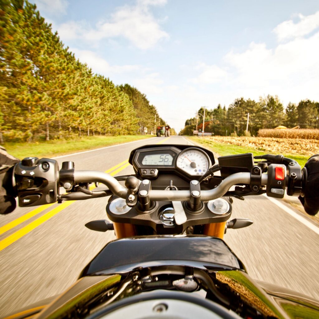 Riding motorcycle on country road